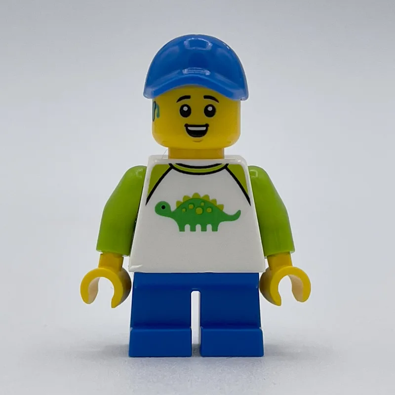 LEGO Minifigur Boy, Dinosaur Shirt, Short Blue Legs, Blue Cap